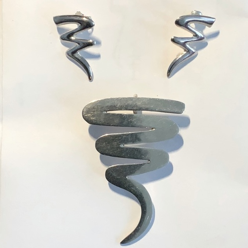 Stamped Silver Brooch/Pendant combo with matching earrings.